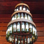 How cool is this wine bottle chandelier? It looks like something you'd find on a rustic wedding Pinterest board!