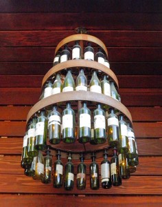 How cool is this wine bottle chandelier? It looks like something you'd find on a rustic wedding Pinterest board!